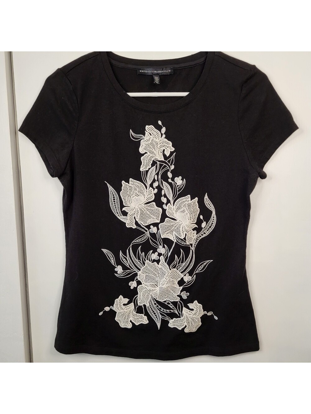White House Black Market black t-shirt,  intricate white floral embroidery XS